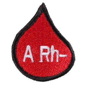 Laastari, jossa on veriryhmäpisara A Rh-
