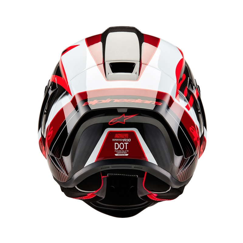 Alpinestars Supertech R-10 Team hiilikuituinen punainen ja valkoinen integraalinen moottoripyöräilykypärä.