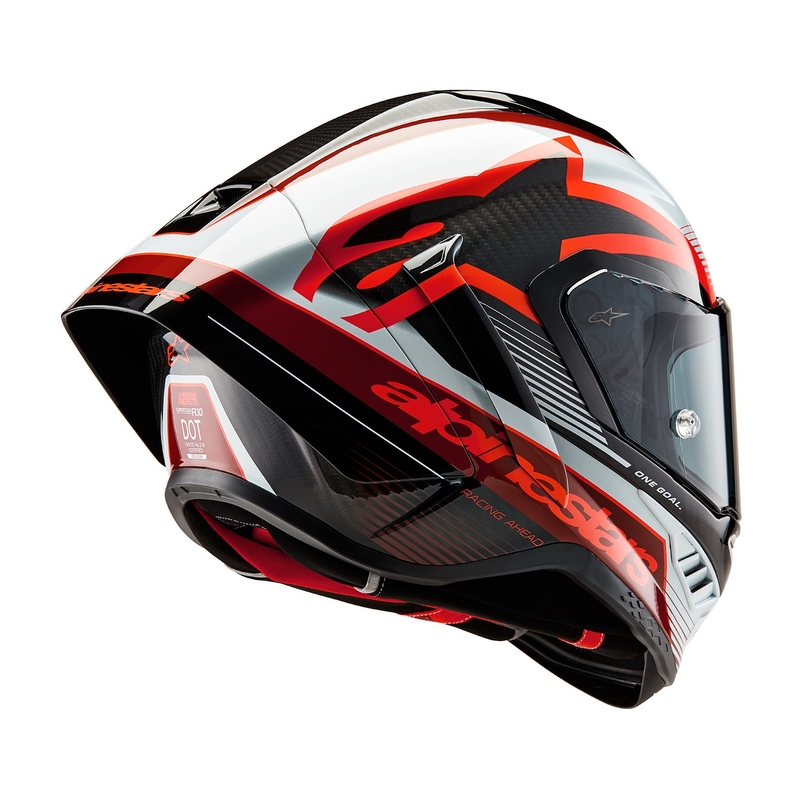 Alpinestars Supertech R-10 Team hiilikuituinen punainen ja valkoinen integraalinen moottoripyöräilykypärä.