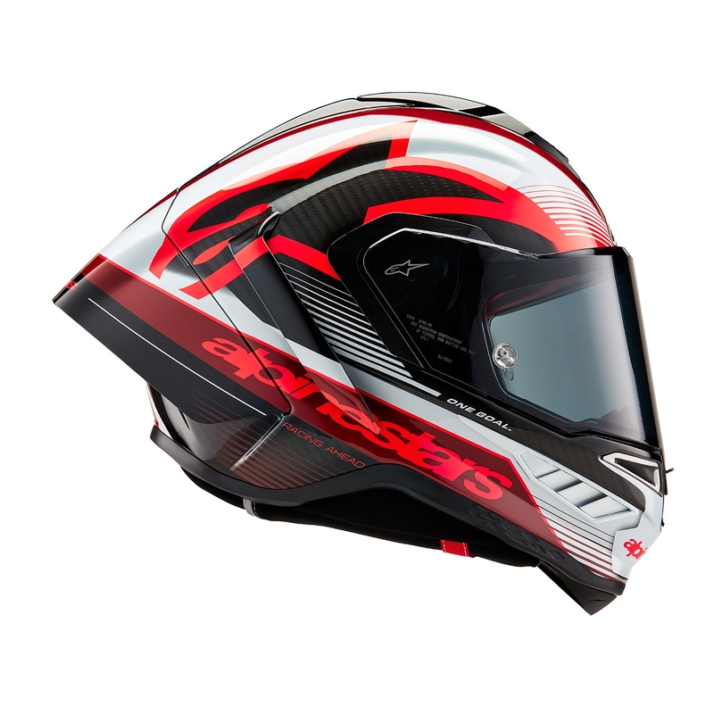 Alpinestars Supertech R-10 Team hiilikuituinen punainen ja valkoinen integraalinen moottoripyöräilykypärä.