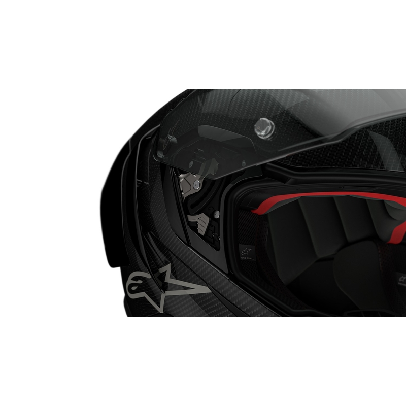 Alpinestars Supertech R-10 Team hiilikuituinen punainen ja valkoinen integraalinen moottoripyöräilykypärä.
