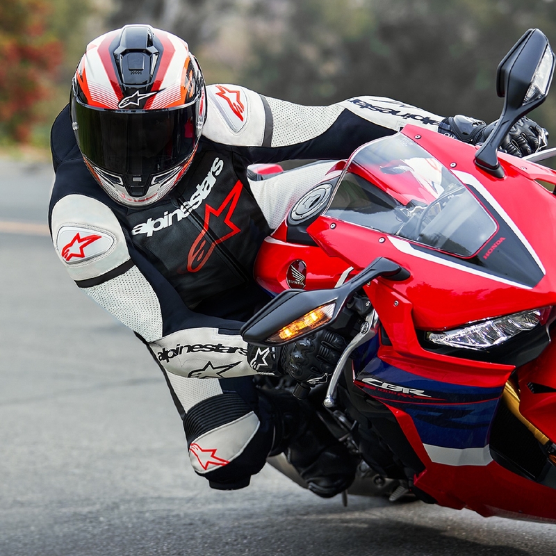 Alpinestars GP Force Lurv fluo punainen-valko-musta yksiosainen nahkainen moottoripyöräpuku