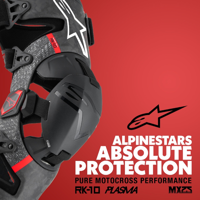Alpinestars Supertech RK-10 Plasma mustat ja punaiset polvituet.