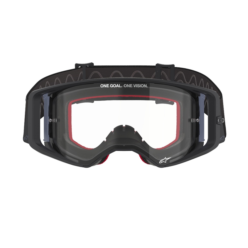 Alpinestars Supertech Corp mustan ja harmaan väriset motocrosslasit kirkkaalla linssillä.