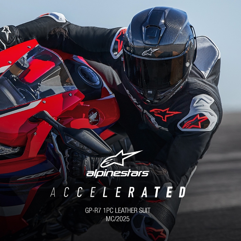 Alpinestars GP-R7 Tech-Air valmis/yhteensopiva musta-valko-fluo-punainen yksiosainen nahkainen moottoripyöräpuku.