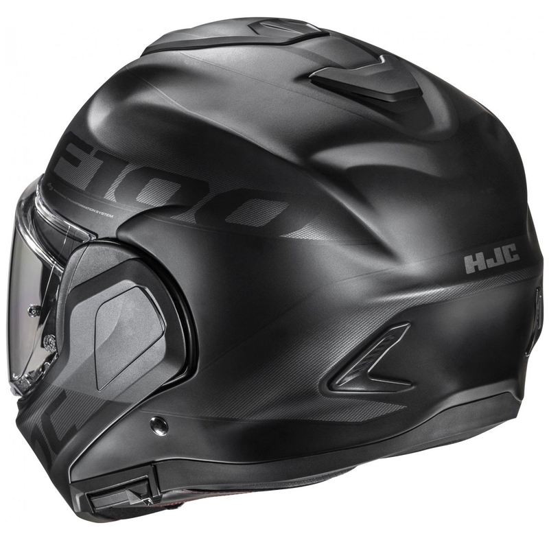 HJC F100 Hetal MC5SF mustanharmaa moottoripyöräilykypärä, joka kääntyy ylöspäin.