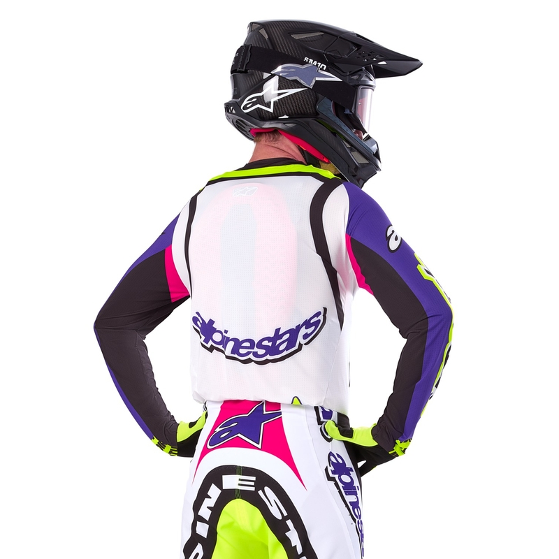 Alpinestars Supertech SX rajoitettu painos Dirt Studios valkoinen-violetti-pinkki-fluokeltainen motocross trikoo