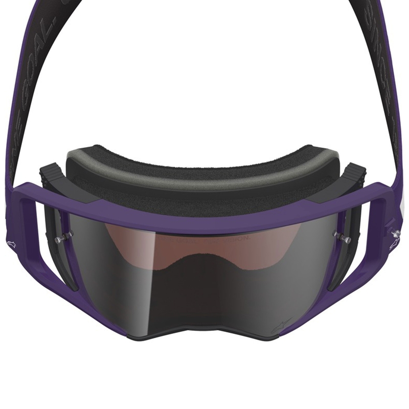 Alpinestars Supertech Vision Hunta96 XXV motocross-lasit violetti ja valkoinen peilillä ja hopeisella pleksillä.