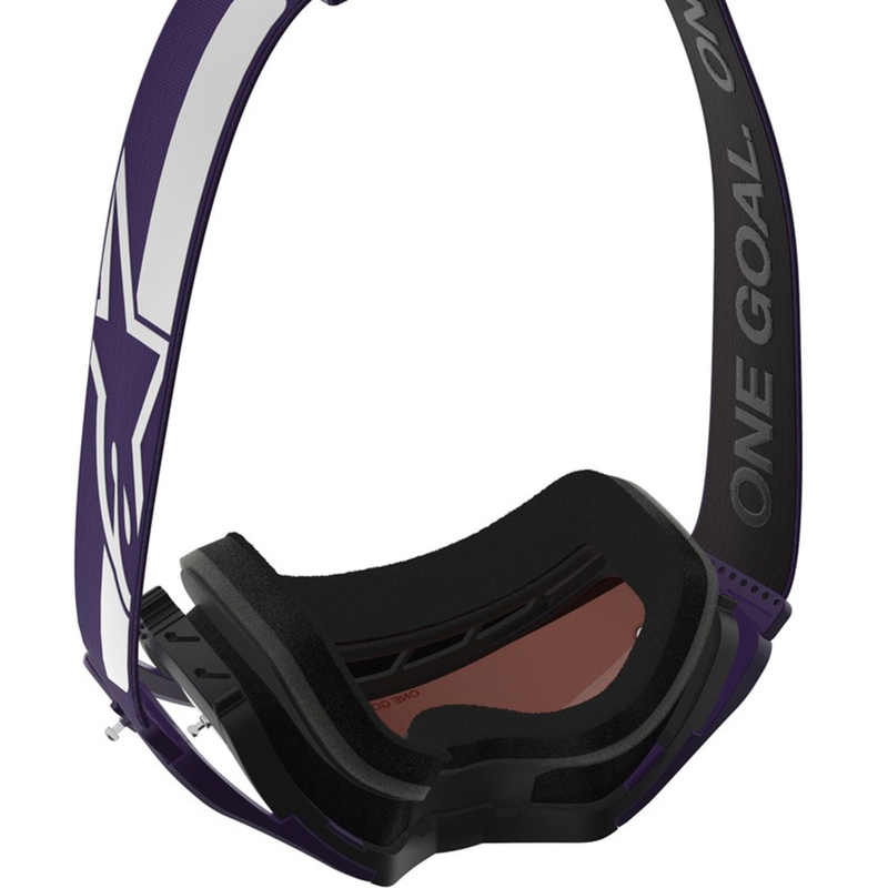 Alpinestars Supertech Vision Hunta96 XXV motocross-lasit violetti ja valkoinen peilillä ja hopeisella pleksillä.
