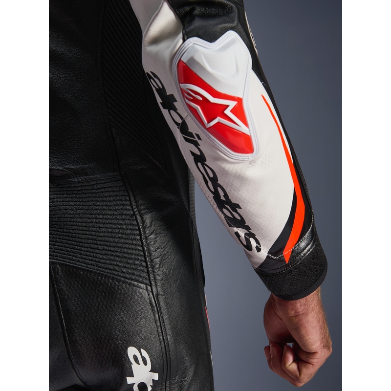 Alpinestars GP TECH V5 nahkainen yksiosainen moottoripyöräpuku musta-valko-fluopunainen