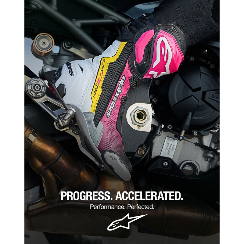 Alpinestars Supertech R moottoripyöräsaappaat musta-valko-pinkki-keltainen