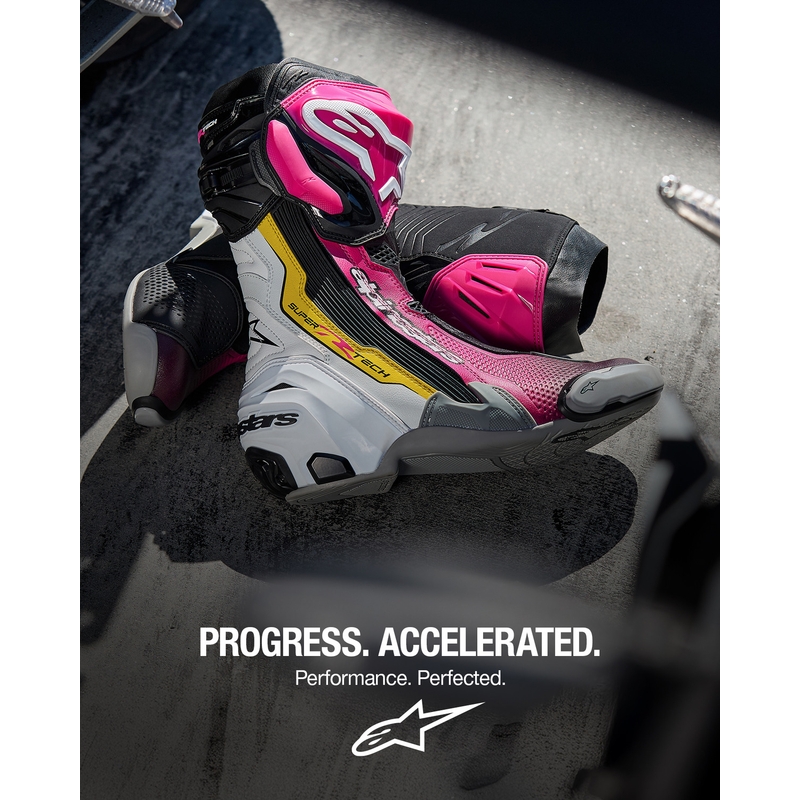 Alpinestars Supertech R moottoripyöräsaappaat musta-valko-pinkki-keltainen