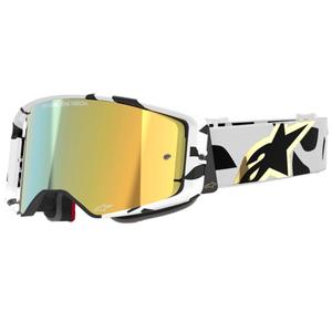 Alpinestars Supertech Corp valkoiset ja kultaiset motocrosslasit, joissa on kultainen peililinssi.